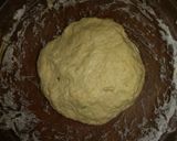 A picture of step 3 of Mandazi with cardamom pods #favoritekidsrecipe.