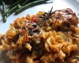 A picture of step 7 of Cheesy Meatball and Pasta bake.