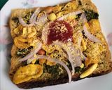 A picture of step 3 of Corn chivda sandwich.