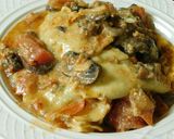 A picture of step 7 of Ravioli (cheese and spinach stuffed Ravioli) Mushroom cream sauce.