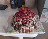 Foto del paso 12 de la receta: Torta deleite con triple rellenos decorada con ganache de chocolate blanco y frambuesas