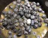 A picture of step 6 of Lemon Pepper Chicken with a Blueberry Orange Wine Sauce.