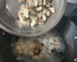 A picture of step 4 of Onam Sadhya Kootu Curry With Kerala Matta Red Rice.