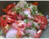 A picture of step 2 of Tomato, Carrot and Cucumber Salad.