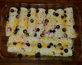 A picture of step 5 of Mike's Seafood Spinach Enchiladas.