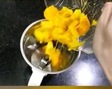 A picture of step 1 of Mango milkshake shots with chocolate syrup.