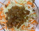 A picture of step 2 of Coleslaw with raisins.