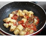 A picture of step 3 of Paalak Aloo.