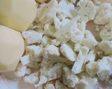 A picture of step 1 of Achari aloo gobhi.