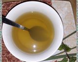A picture of step 4 of Lemon grass and mint leaves tea.