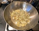 A picture of step 5 of Penne al'arrabiata (pasta with a spicy tomato sauce).