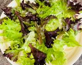 A picture of step 1 of Greek salad with shrimps.