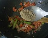 A picture of step 4 of Baingan Masala (Baked Aubergines).