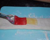 A picture of step 12 of Gata (walnuts rolled  sweets).