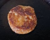 A picture of step 3 of Tawa Veg Tikki Burger.