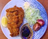 A picture of step 12 of Tonkatsu (Japanese style fried pork cutlet).