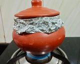 A picture of step 7 of Matka Veg Dum Biryani.