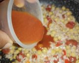 Foto del paso 3 de la receta: Arroz rojo con garbanzos y chorizo