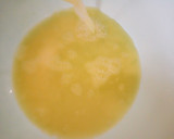 A picture of step 3 of Cucumber ginger and orange juice.