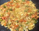 A picture of step 9 of Tawa omelete.