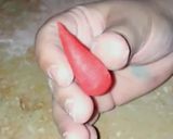 A picture of step 5 of Valentines day special fondant red rose cake topper.