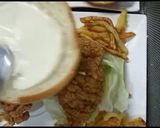 A picture of step 7 of Crisp fry chicken burgers 👌😋.