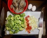 A picture of step 1 of Broccoli egg drop soup with prawns.