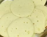 A picture of step 2 of Nolen Gurer Chitai Dudh Pithe.