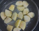 A picture of step 1 of Apple with jaggery murabba.