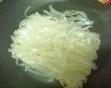 A picture of step 1 of Rice Fettuccine Pasta in Alfredo sauce.