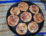 A picture of step 3 of Mini pinwheel pizza bites.