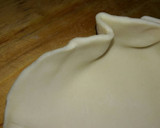 Foto del paso 2 de la receta: Canastitas rápidas de queso y cebolla
