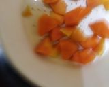 A picture of step 1 of Papaya fruit salad.