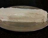 A picture of step 25 of Patriotic Vanilla Cake Roll with Whipped White Chocolate Ganache Filling and Frosting.