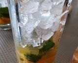 A picture of step 2 of Orange mojito.