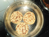 Mkate wa tandoori with coconut bean stew