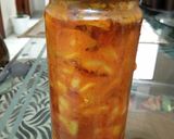 A picture of step 5 of Mango pickle with asafoetida.