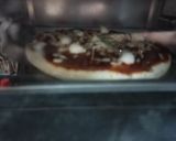 A picture of step 2 of Cheesy pizza.