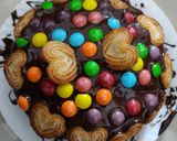 A picture of step 5 of Bourbon Biscuit and Gems cake.
