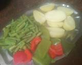 Foto del paso 4 de la receta Pechuga de pollo adobada al ajillo a la plancha con menestra de verduras y papas cocidas
