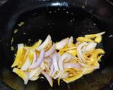 A picture of step 4 of Masala tilapia fish fry.
