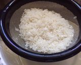 A picture of step 1 of Chicken, Mushroom, and Corn Congee.