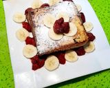 A picture of step 3 of French Toast with banana n Strawberry 😋.