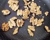A picture of step 1 of Sesame and Walnut Ladoo.