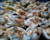 A picture of step 4 of Baked shell pasta stuffed with creamy sauce.
