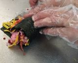A picture of step 11 of Rose Sushi Roll.