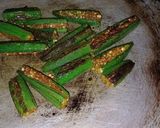 A picture of step 3 of Masala okra with dry coconut.