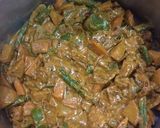 A picture of step 4 of Saffron vegetable Pullav with Onion Raita.