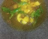 A picture of step 1 of Tasty Onion Masala Rice.