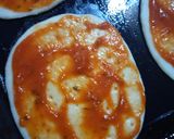A picture of step 5 of Mini pizza(without cheese).